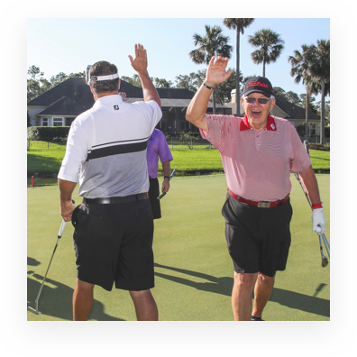 Golfers high-fiving