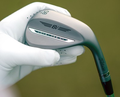 Golfer Holds SM11 Wedge