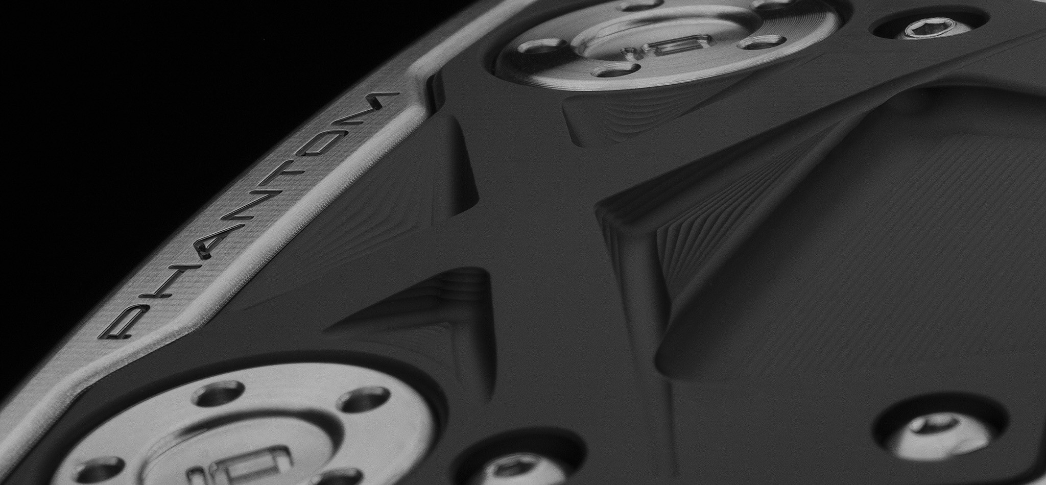 Bob Vokey holding SM9 wedge