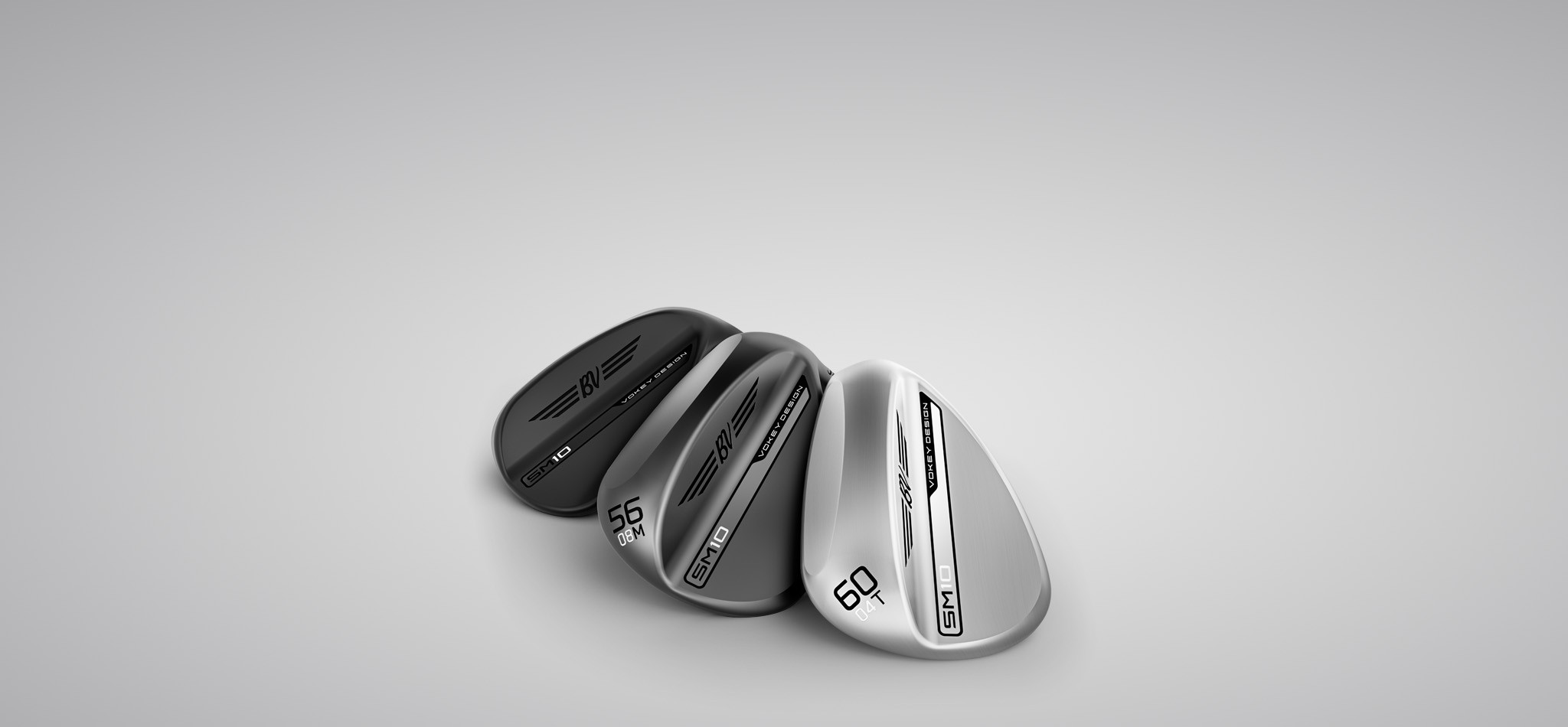 Bob Vokey holding SM9 wedge.